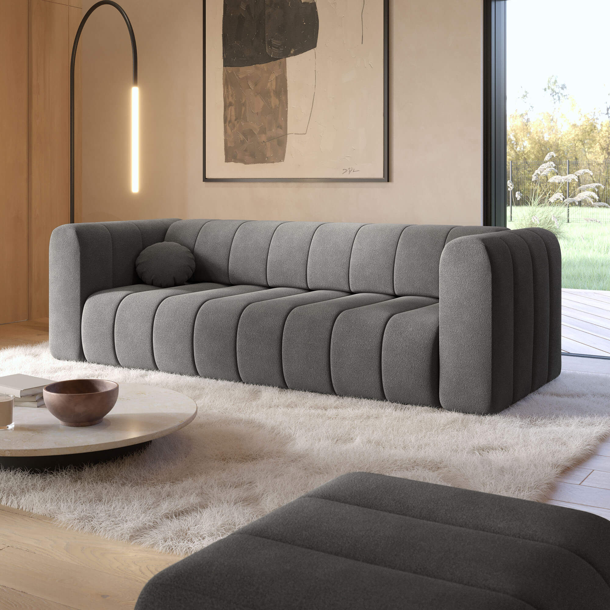 Szara sofa rozkładana FUMO z funkcją spania i pojemnikiem na pościel